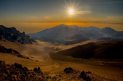 Sunrise illuminating the crater at Haleakala